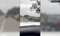 Cars Line Up for Sandbags in St. Petersburg, Florida, as Hurricane Milton Looms