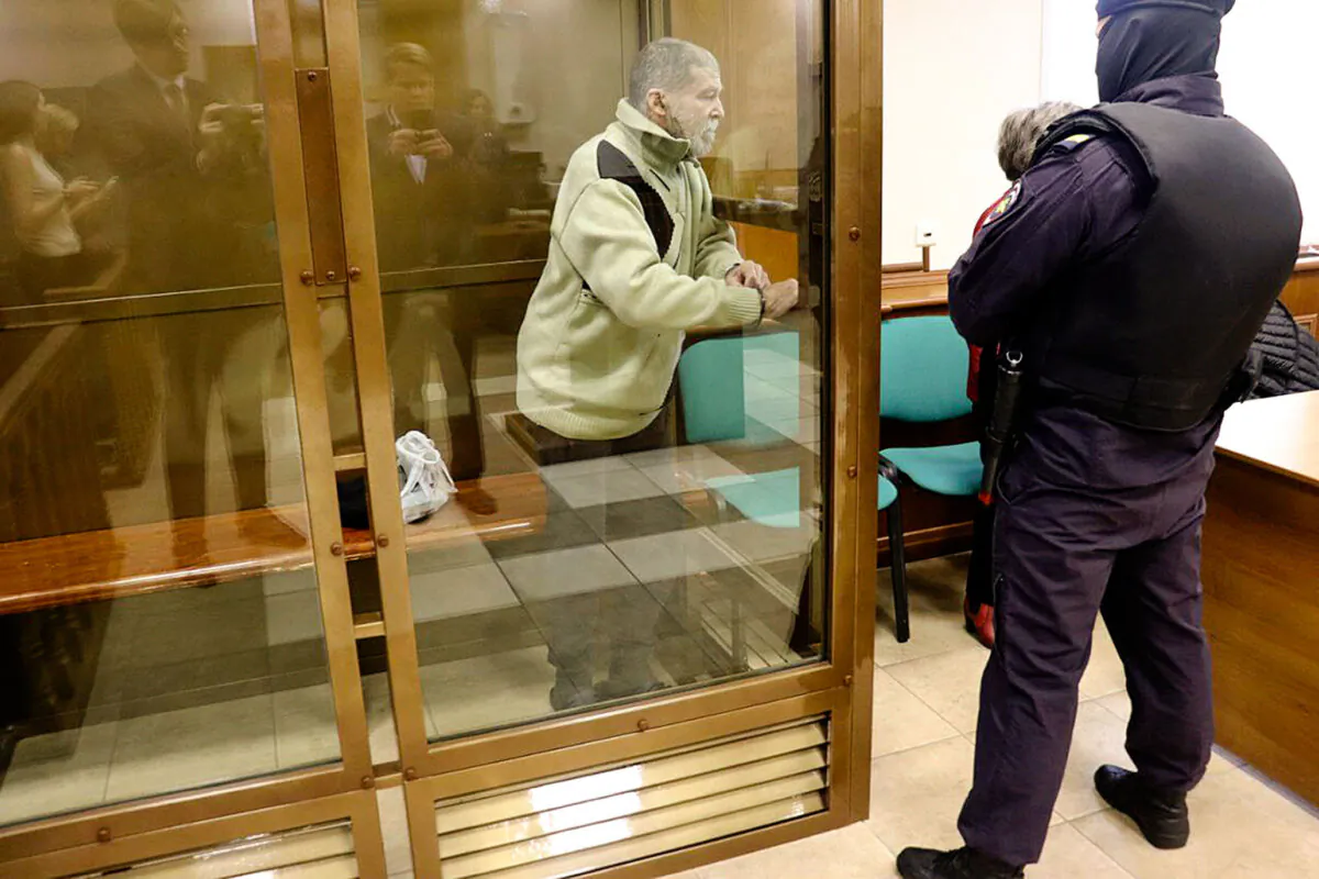 Stephen Hubbard, a U.S. citizen accused of fighting as a mercenary in Ukraine against Russia, stands in a glass cage during a court session in the Moscow City court in Moscow on Oct. 7, 2024. (Moscow City Court Press Service via AP)