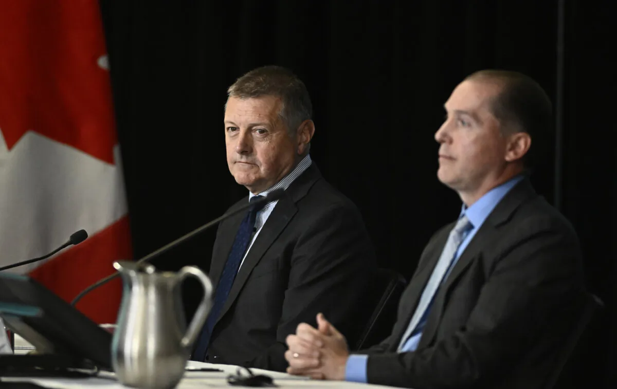 Rob Stewart (L), former deputy minister of public safety, and Dominic Rochon, a former senior official at Public Safety Canada, appear as witnesses at the Foreign Interference Commission in Ottawa on Oct. 8, 2024. (Justin Tang/The Canadian Press)