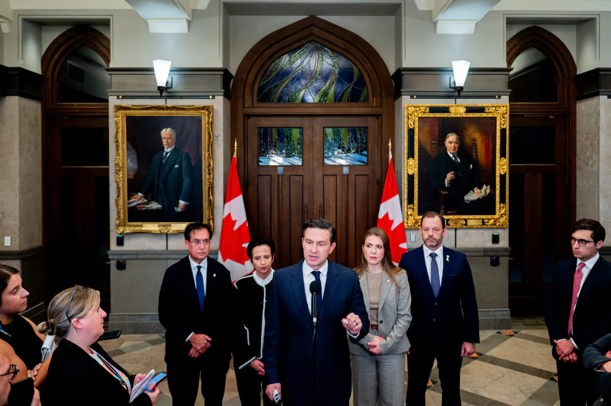 Conservative Leader Pierre Poilievre speaks in the foyer of the House of Commons on Parliament Hill in Ottawa, on Oct. 8, 2024. (The Canadian Press/Spencer Colby)