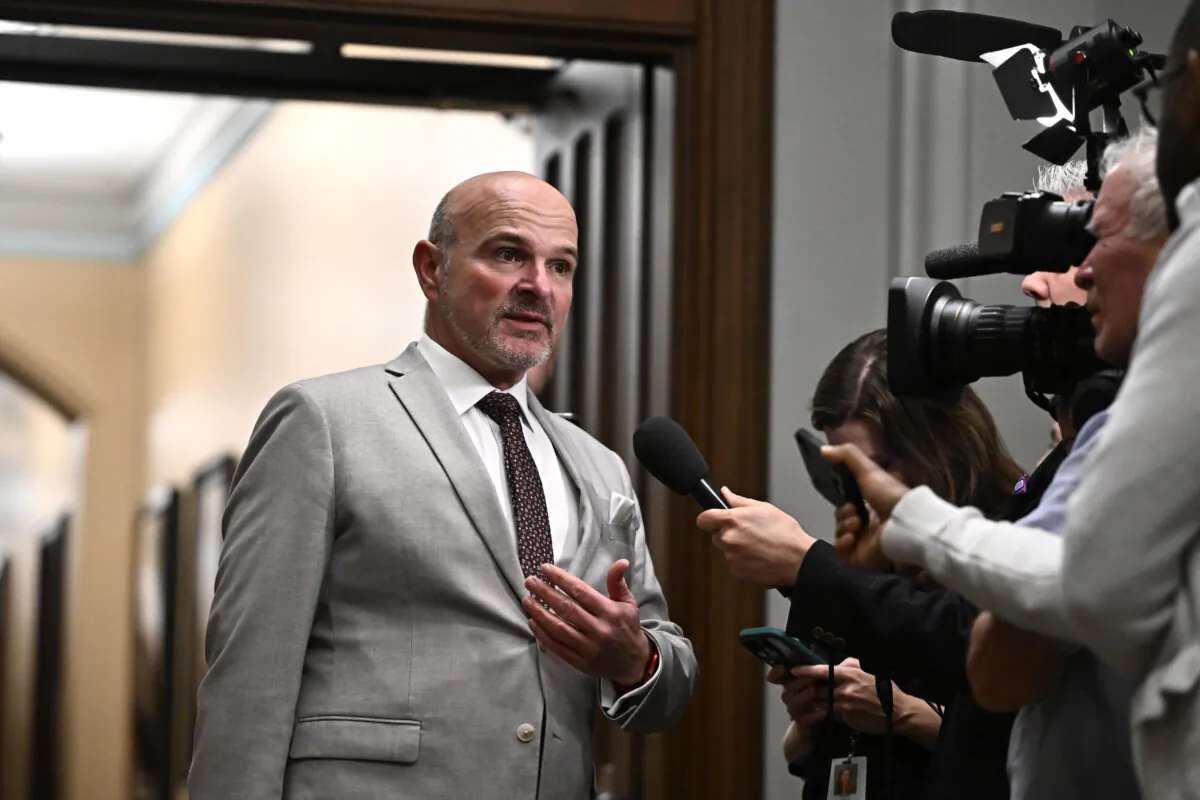 Then-Minister of Employment, Workforce Development and Official Languages Randy Boissonnault takes questions from reporters before a meeting of the Liberal caucus on Parliament Hill in Ottawa on Oct. 9, 2024. (The Canadian Press/Justin Tang)