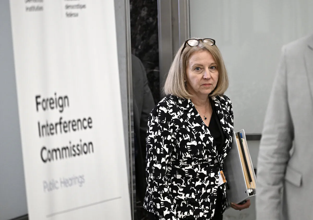 Nathalie Drouin, National Security and Intelligence Advisor to the Prime Minister, leaves the hearing room during a break at the Foreign Interference Commission in Ottawa, on Oct. 8, 2024. (Justin Tang/The Canadian Press)