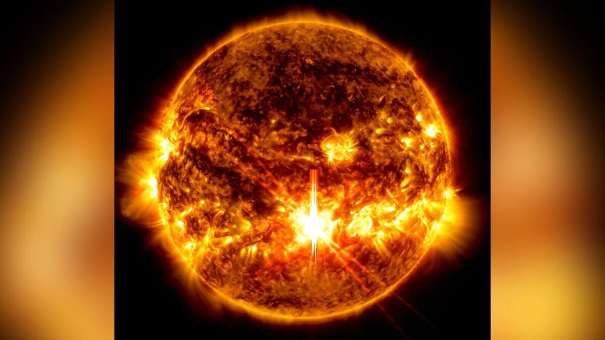 A solar flare, the bright flash in the center of the image, on Oct. 3, 2024. (Solar Dynamics Observatory/NASA via AP)
