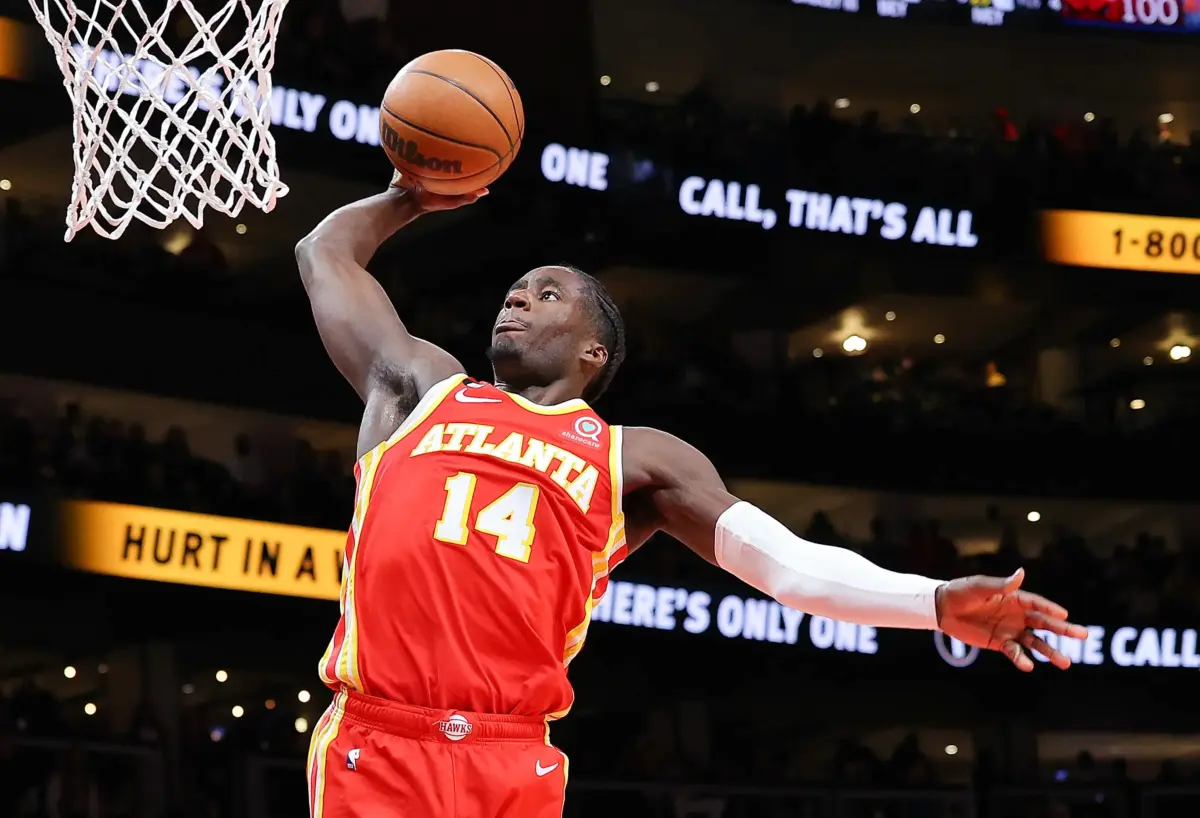 AJ Griffin #14 of the Atlanta Hawks dunks against the Detroit Pistons during the fourth quarter at State Farm Arena in Atlanta, Georgia, on Dec. 23, 2022. (Kevin C. Cox/Getty Images)