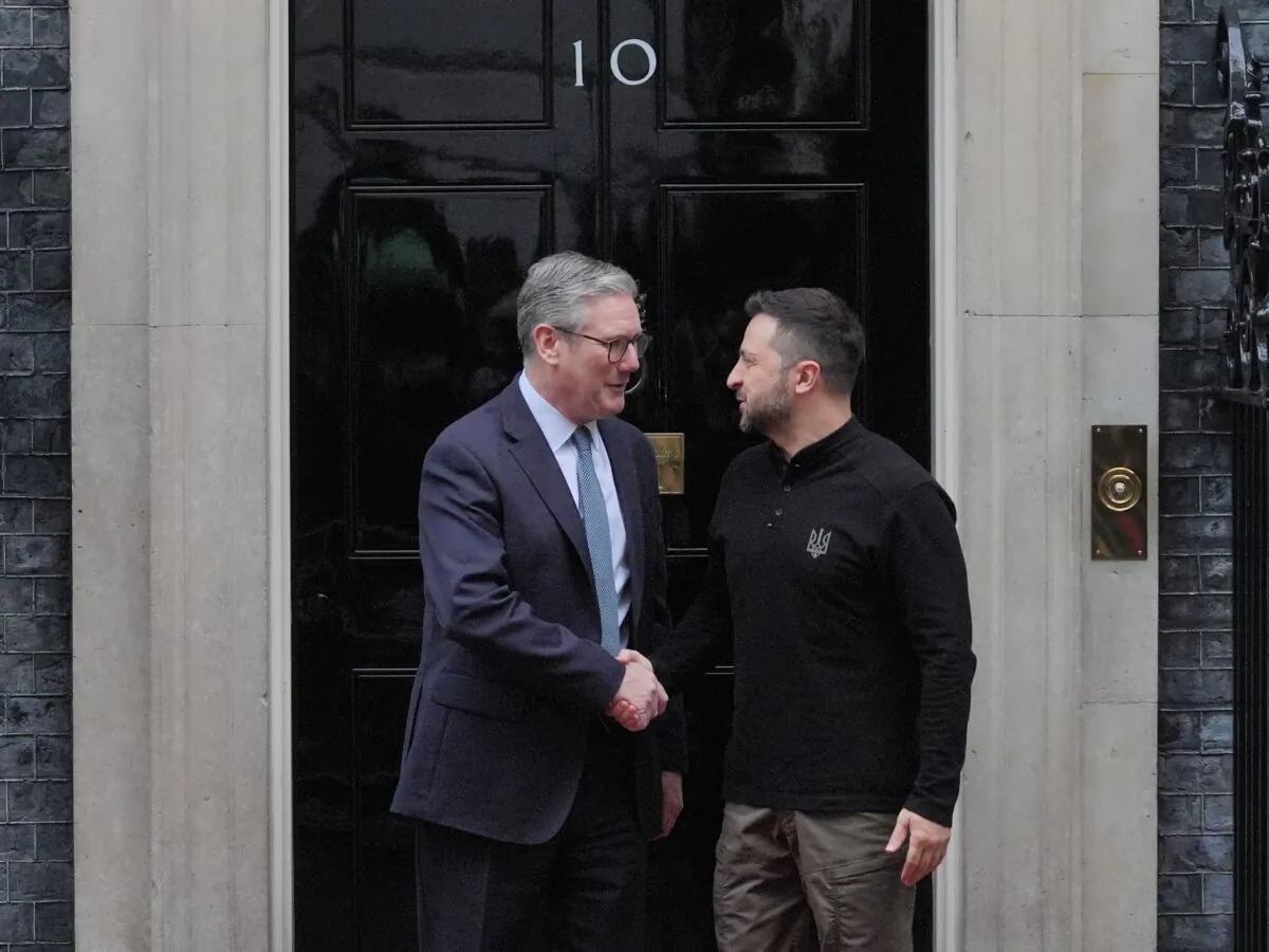Ukrainian President Volodymyr Zelenskyy is greeted by Prime Minister Sir Keir Starmer as he arrives in Downing Street in London on Oct. 10, 2024.(Jonathan Brady/PA)