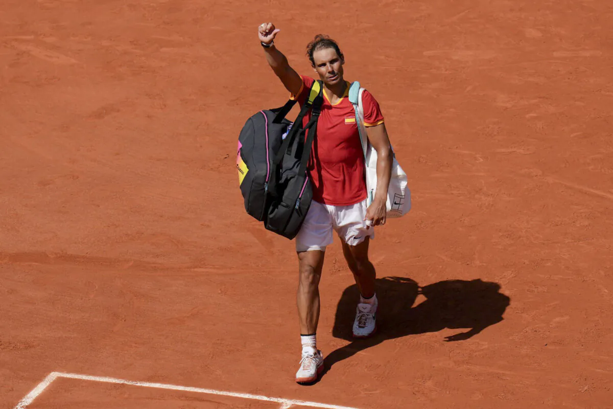 Rafael Nadal leaves the court after losing to Novak Djokovic in a second-round match at the Olympics in Paris on July 29, 2024. (Manu Fernandez/AP Photo)