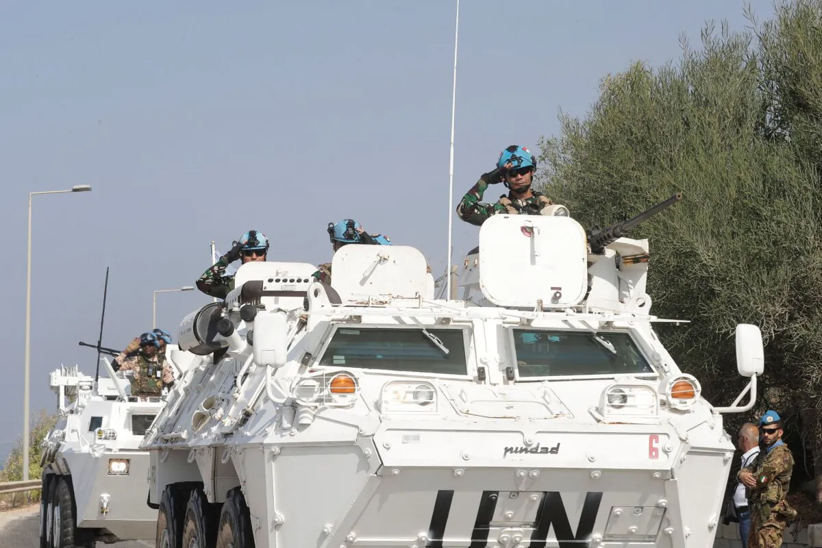 U.N. Interim Force in Lebanon vehicles drive along the main road leading to Lebanon's southern town of Naqoura, close to the border with Israel, on Oct. 27, 2022. (Mahmoud Zayyat/AFP via Getty Images)