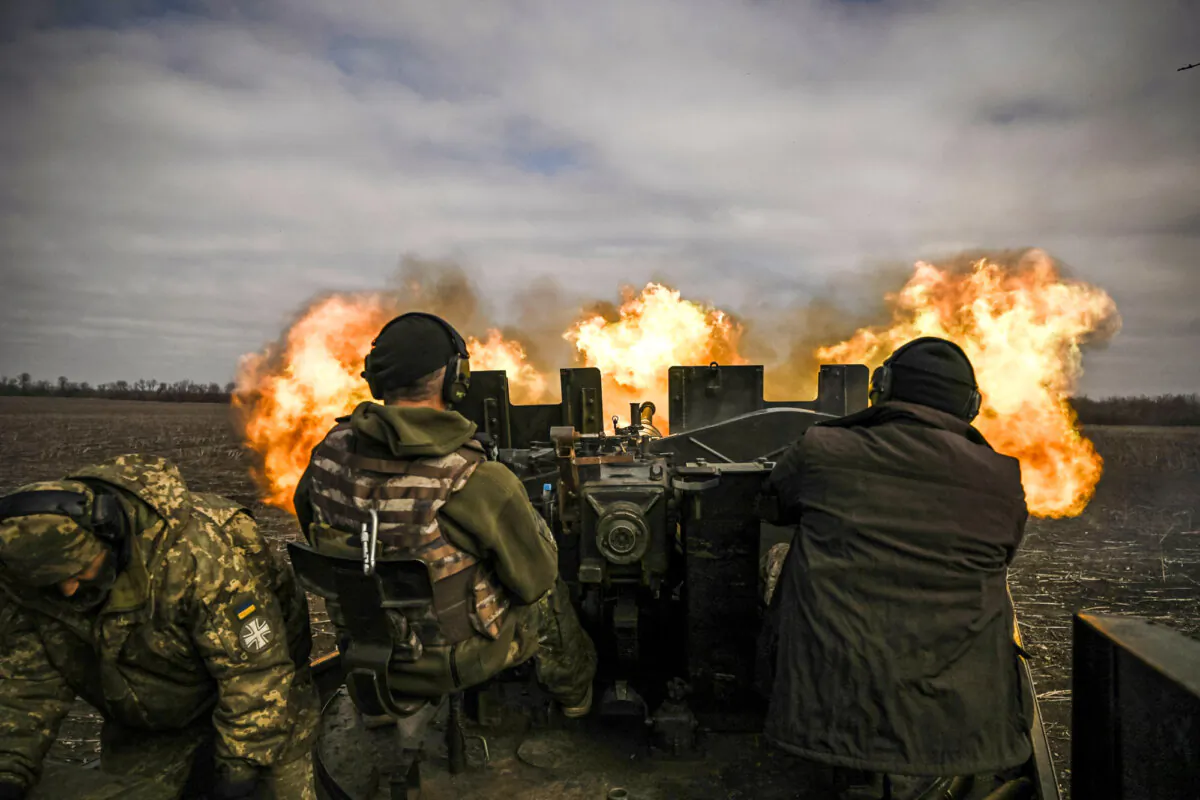 Ukrainian servicemen fire at Russian positions amid the Russia–Ukraine war near Bakhmut, Ukraine, on March 20, 2023. (Aris Messinis/AFP via Getty Images)