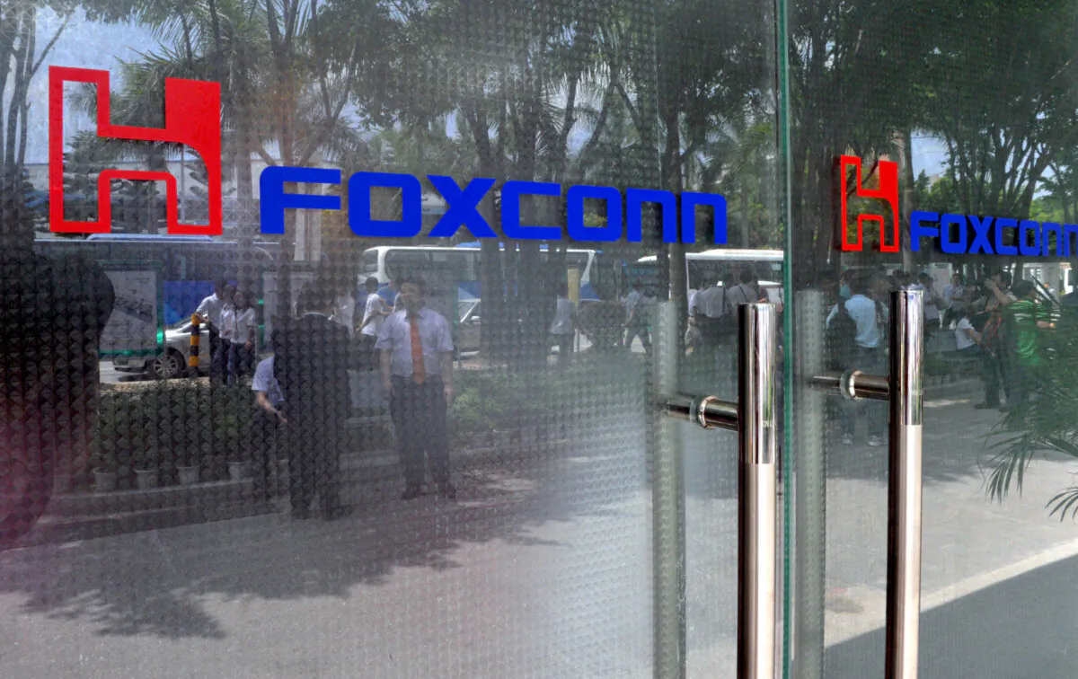 A glass door bearing the logo of the Foxconn technology group at the company's plant in Shenzhen, China, on May 26, 2010. (Voishmel/AFP via Getty Images)