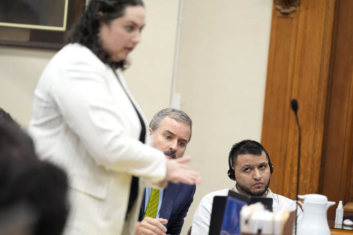 Defense attorney Kaitlyn Beck speaks to a witness as Jose Ibarra (R), accused of killing nursing student Laken Hope Riley, appears in court for a motion hearing in Athens, Ga. on Oct. 11, 2024. (AP Photo/Brynn Anderson, Pool)