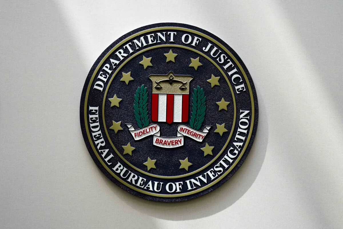 An FBI seal is seen on a wall on Aug. 10, 2022, in Omaha, Neb. A Pakistani national residing in Ontario and arrested in Quebec last week over an alleged Islamic State terror plot to kill Jewish people in New York City has a court appearance today in Montreal. THE CANADIAN PRESS/AP-Charlie Neibergall