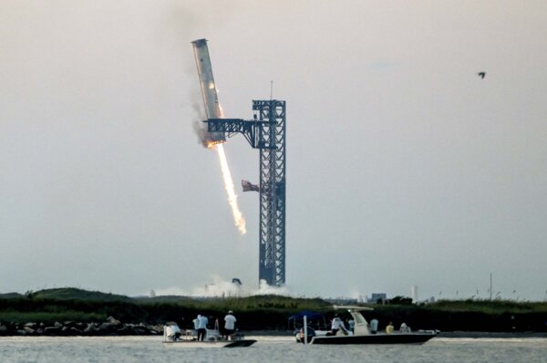 SpaceX Catches Giant Starship Booster With Mechanical Arms