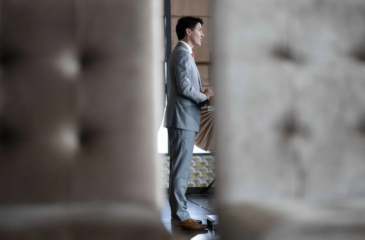 Prime Minister Justin Trudeau speaks during a news conference in Vientiane, Laos, on Oct. 11, 2024. (The Canadian Press/Adrian Wyld)