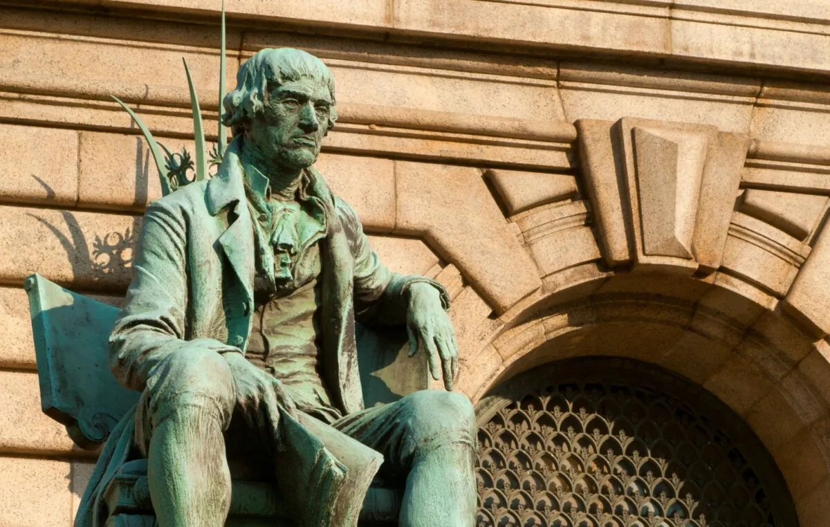 A statue of Thomas Jefferson looking unimpressed in front of the Cuyahoga County Courthouse in Cleveland, Ohio, 2022. (Kenneth Sponsler/Shutterstock)