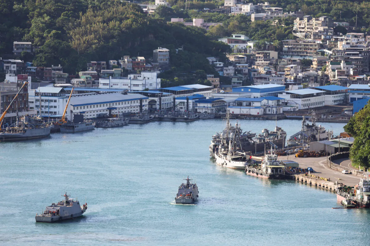 A pair of Taiwanese navy Kuang Hua VI-class missile boats sail in Keelung harbour on Oct. 14, 2024. (I-Hwa Cheng/AFP via Getty Images)