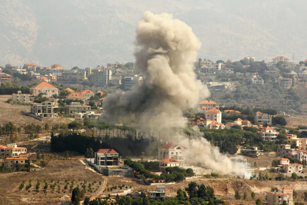 Smoke rises from the site of an Israeli airstrike that targeted the southern Lebanese village of Khiam on Oct. 13, 2024, amid the continuing war between Hezbollah and Israel. (AFP via Getty Images)