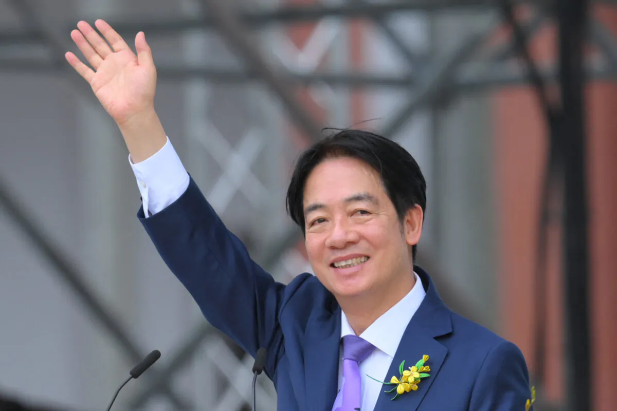 Taiwanese President Lai Ching-te waves as he delivers his inaugural speech after being sworn into office during the inauguration ceremony at the Presidential Office Building in Taipei on May 20, 2024. (Photo by Sam YEH / AFP) (Photo by SAM YEH/AFP via Getty Images)
