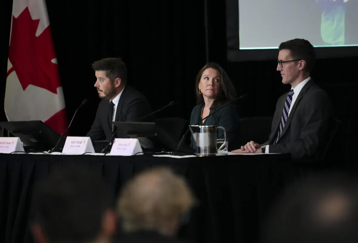 (L-R) Prime Minister Justin Trudeau's senior global affairs adviser Patrick Travers, chief of staff Katie Telford, and deputy chief of staff Brian Clow appear as witnesses at the Foreign Interference Commission in Ottawa on Oct. 15, 2024. (Sean Kilpatrick/The Canadian Press)