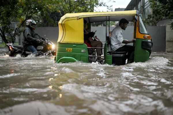 Day in Photos: Defamation Lawsuit, Rain Havoc, and Egyptian Mega-Museum