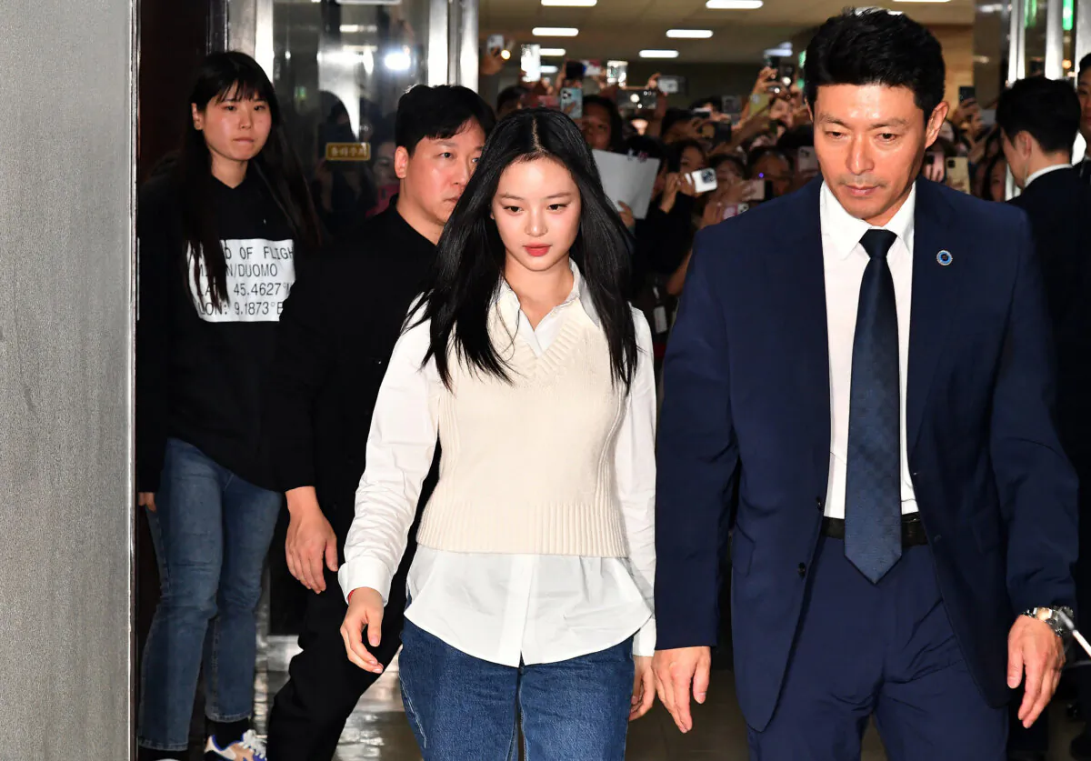 New Jeans' Hanni arrives to testify at the National Assembly for hearing in Seoul, South Korea on Oct. 15, 2024. (Kim Min-Hee - Pool/Getty Images)