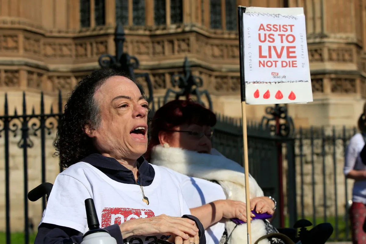 Actress and disability rights activist Liz Carr outside the Houses of Parliament in London as MPs debate and vote on the Assisted Dying Bill, which MPs voted against in London, England, on Sept. 11, 2015. (Jonathan Brady/PA Wire)
