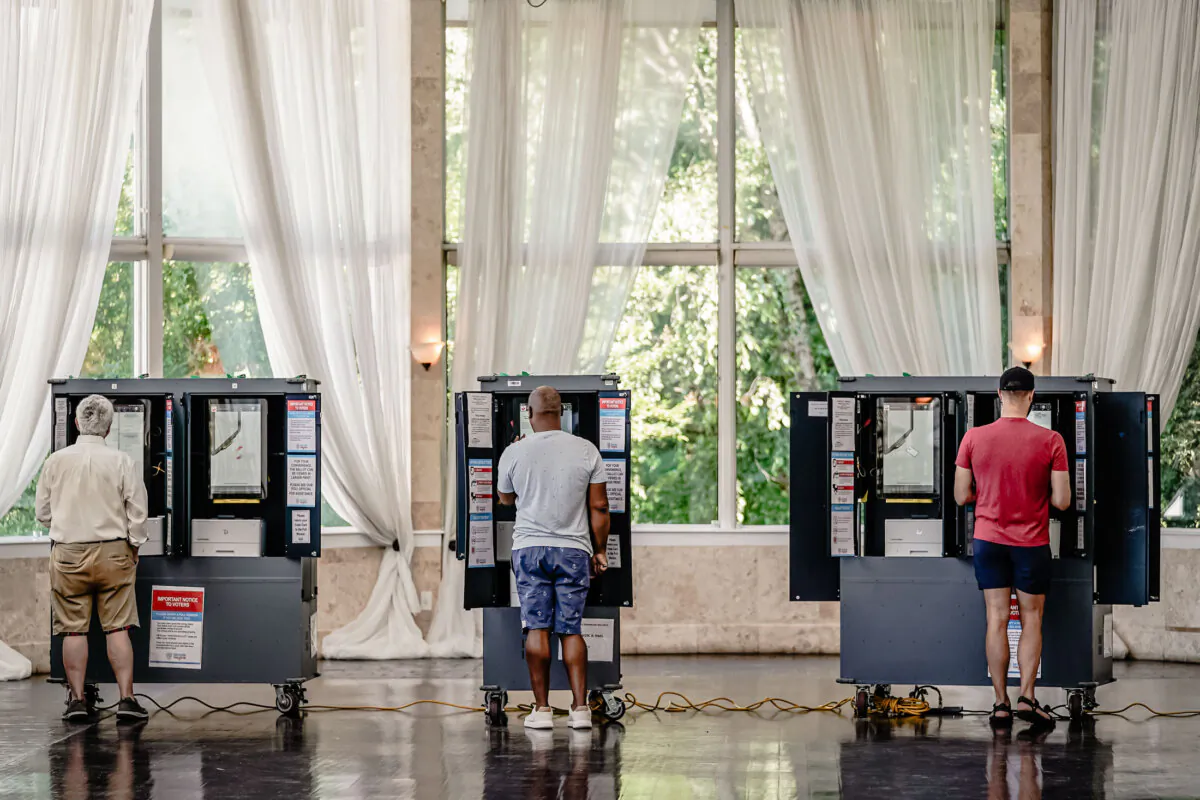 Voters cast ballots in Georgia's primary election at a polling location in Atlanta on May 21, 2024. (Elijah Nouvelage/Getty Images)