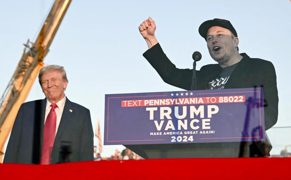 Elon Musk (R) speaks on stage as he joins former President Donald Trump (L) during a campaign rally at site of his first assassination attempt in Butler, Pa., on Oct. 5, 2024. (Jim Watson/AFP via Getty Images)