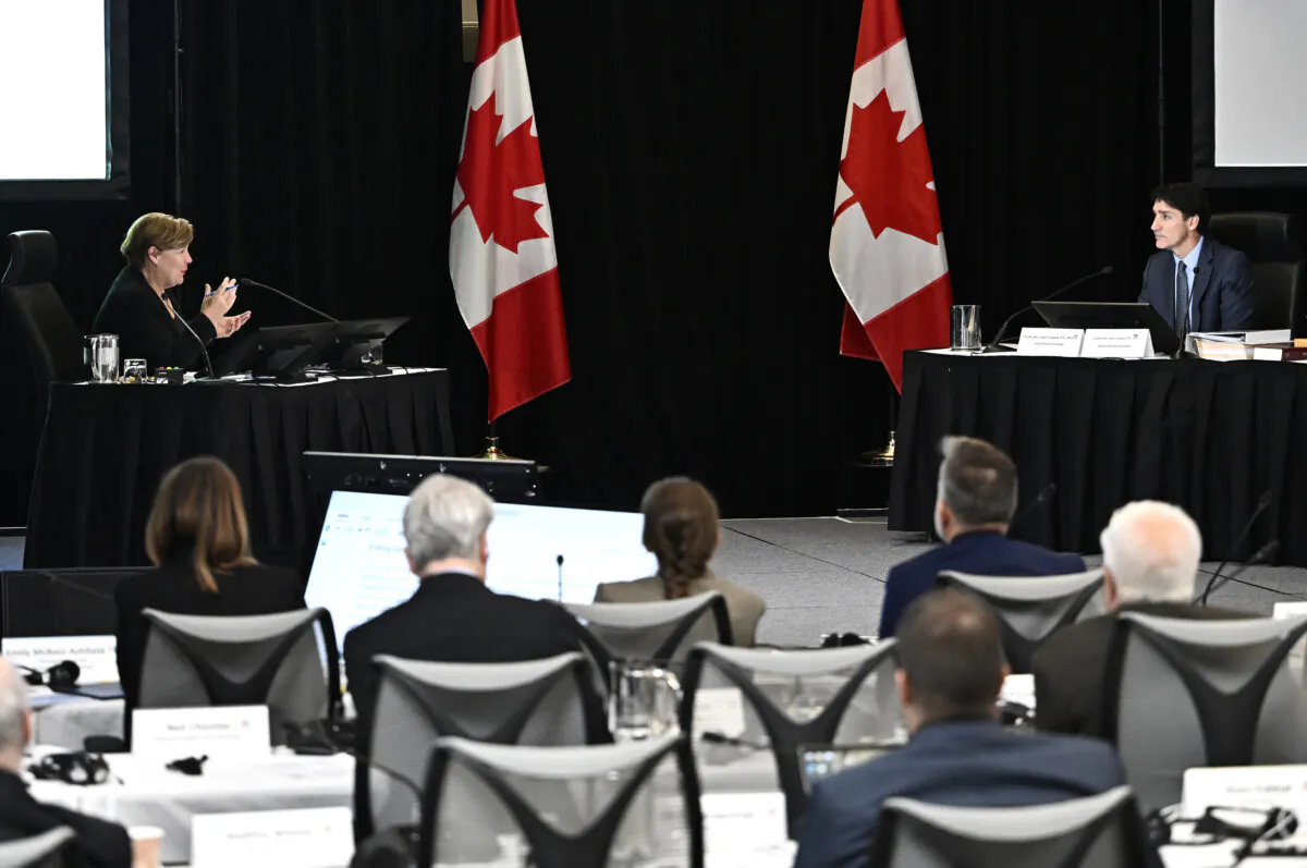 Commissioner Justice Marie-Josée Hogue asks Prime Minister Justin Trudeau a question as he appears as a witness before the Foreign Interference Commission in Ottawa, on Oct. 16, 2024. (The Canadian Press/Justin Tang)