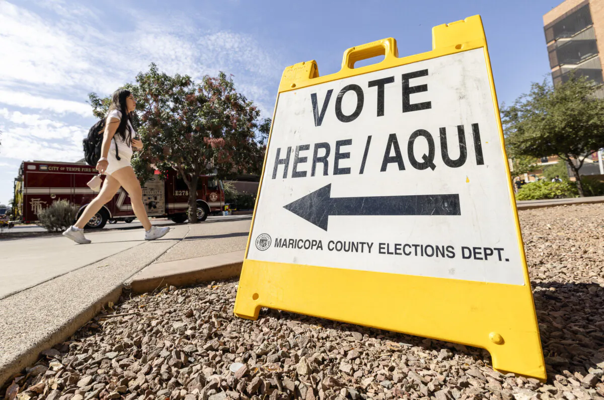 Voters prepare to cast early ballots in Tempe, Ariz., on Oct. 10, 2024. (John Fredricks/The Epoch Times)