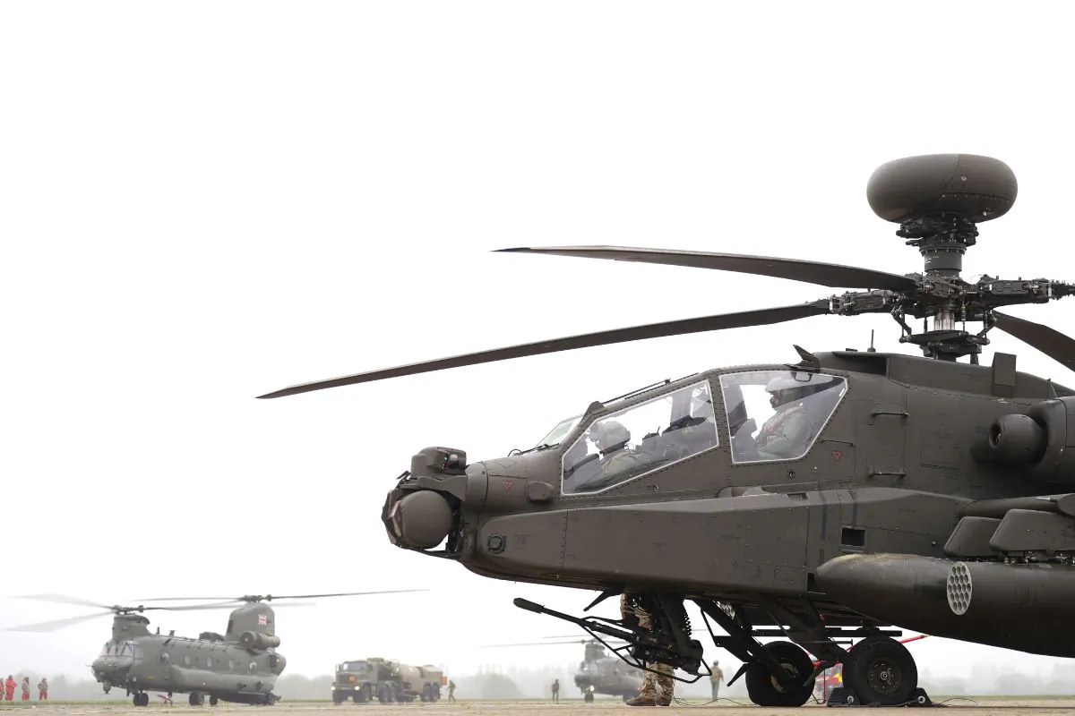 British military helicopters, heading to Estonia to train alongside NATO allies, leave from Wattisham Flying Station, in Suffolk, England, on April 23, 2024. (Joe Giddens/PA Wire)