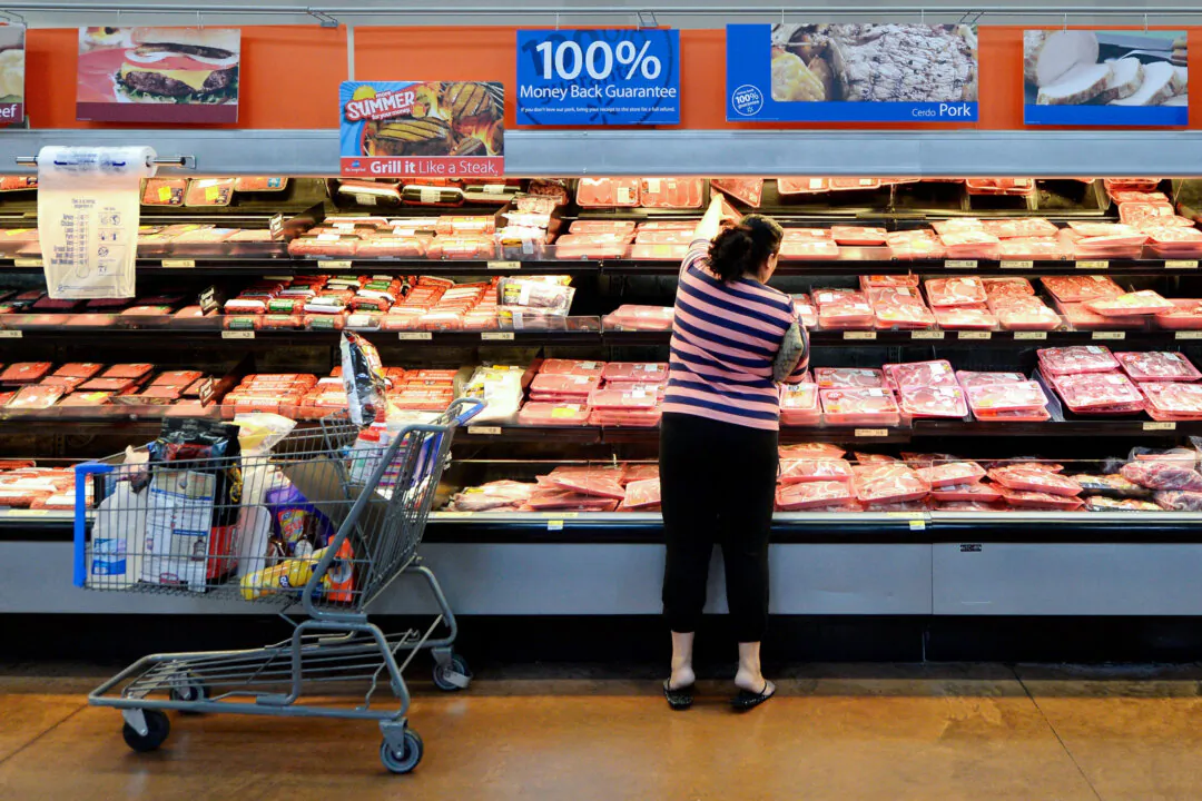 A customer buys fresh meat inside a Walmart Supercenter store in Pico Rivera, Calif., on May 30, 2013. (Kevork Djansezian/Getty Images)