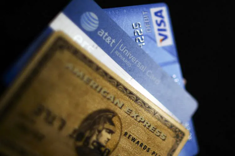 A study says that credit cards often make the wealthy wealthier and those who are less fortunate more in debt. (Spencer Platt/Getty Images)