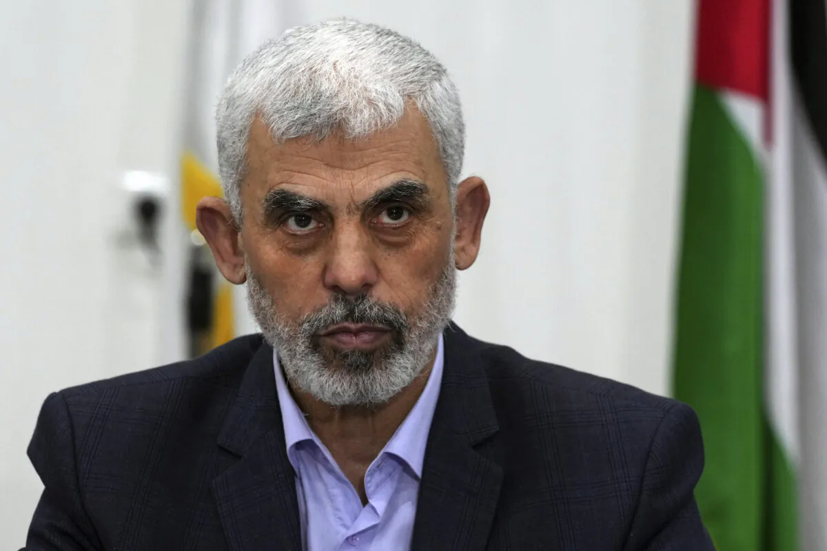 Hamas leader Yahya Sinwar chairs a meeting with leaders of Palestinian factions at his office in Gaza City, on April 13, 2022. (The Canadian Press/AP-Adel Hana)