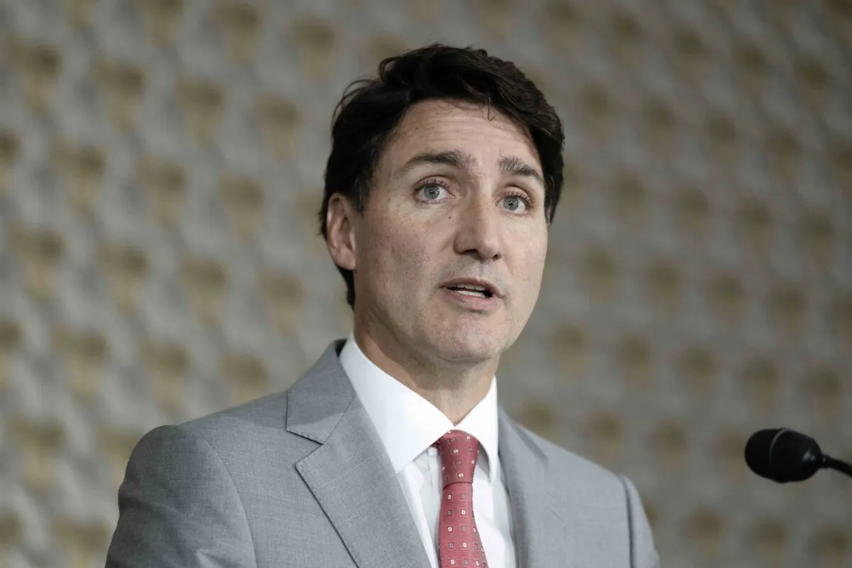 Prime Minister Justin Trudeau reponds to a question during a news conference in Vientiane, Laos, on Oct. 11, 2024. (The Canadian Press/Adrian Wyld)