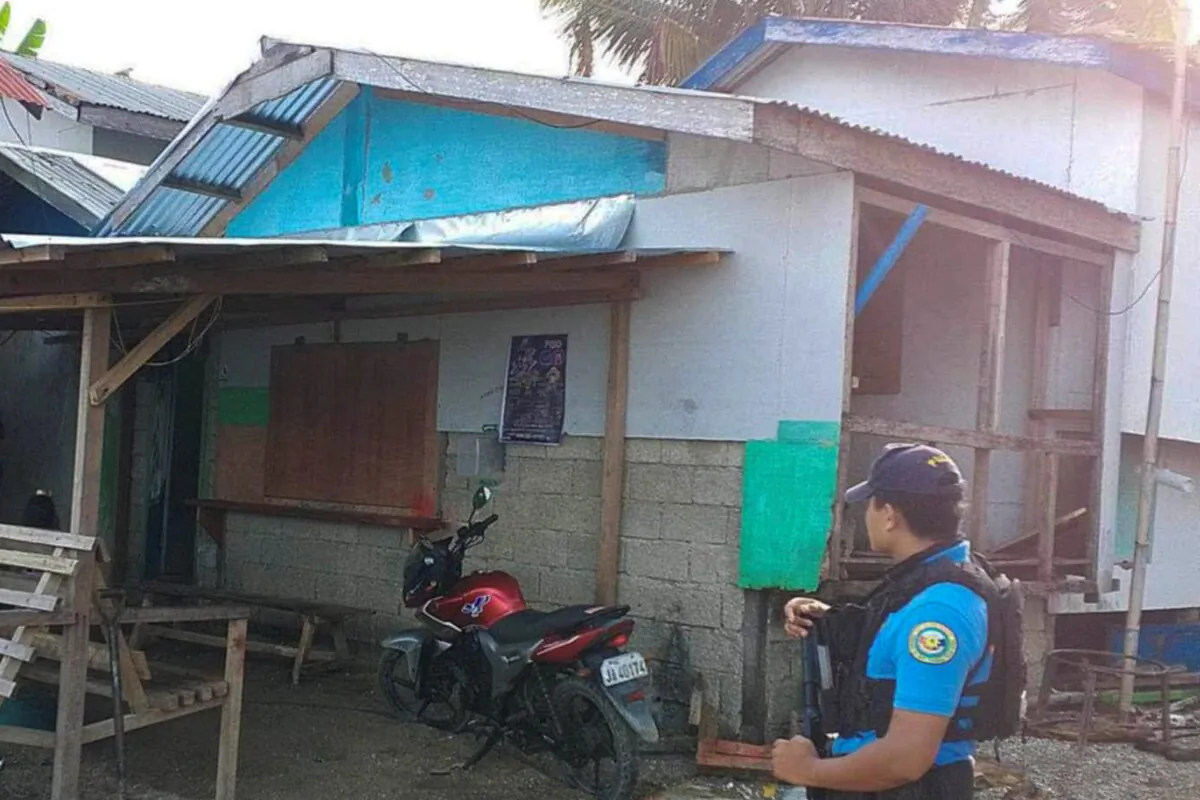 A policeman checks an area where an American identified as Elliot Onil Eastman, from Vermont, was reportedly abducted by gunmen in Sibuco town, Zamboanga del Norte province, southern Philippines, on Oct. 18, 2024. (Philippine National Police Regional Office 9 via AP)