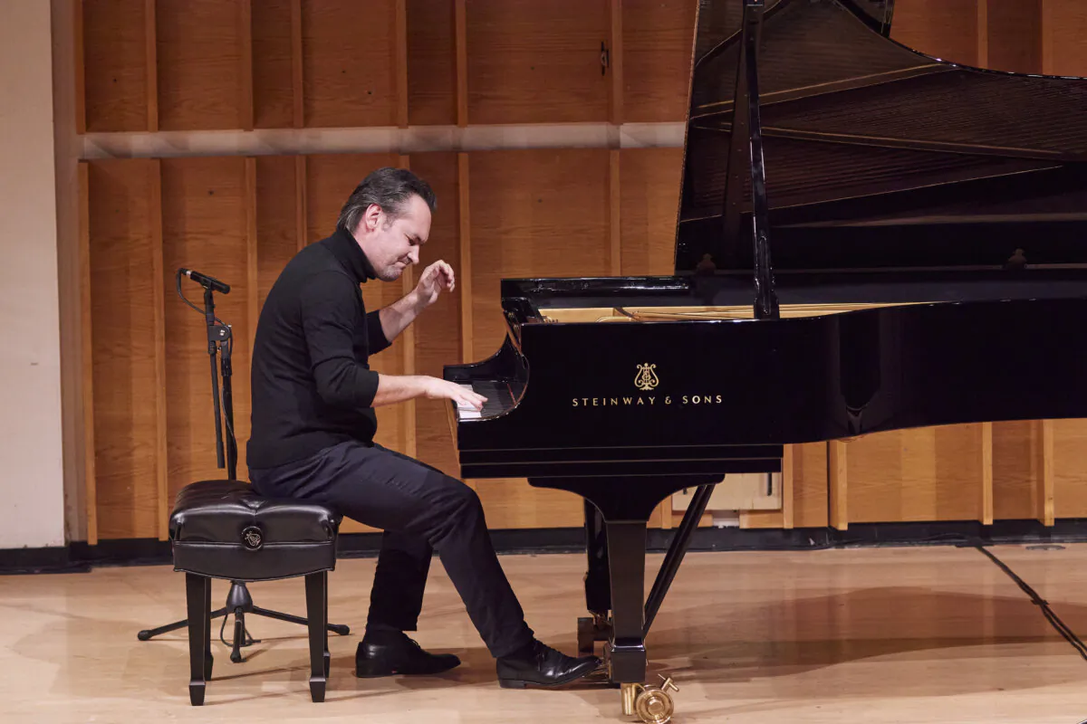 Timur Mustakimov plays in Future Stars Concert at Kaufman Music Center in New York on Nov. 2, 2022. (Wolfgang Lian/The Epoch Times)