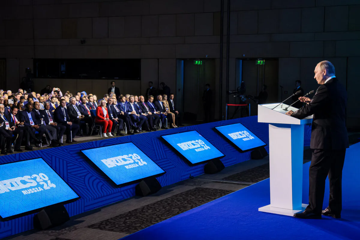Russian President Vladimir Putin gives a speech during a BRICS business forum in Moscow on Oct, 18, 2024. (Mikhail Metezel/AFP via Getty Images)