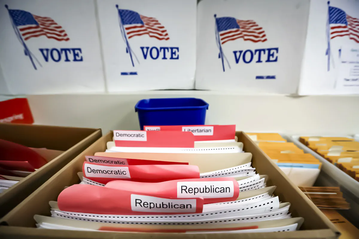 Ballots for the primary elections are arranged by party affiliation at the Lancaster County Election Committee offices in Lincoln, Neb., on April 14, 2020. (Nati Harnik/AP Photo)