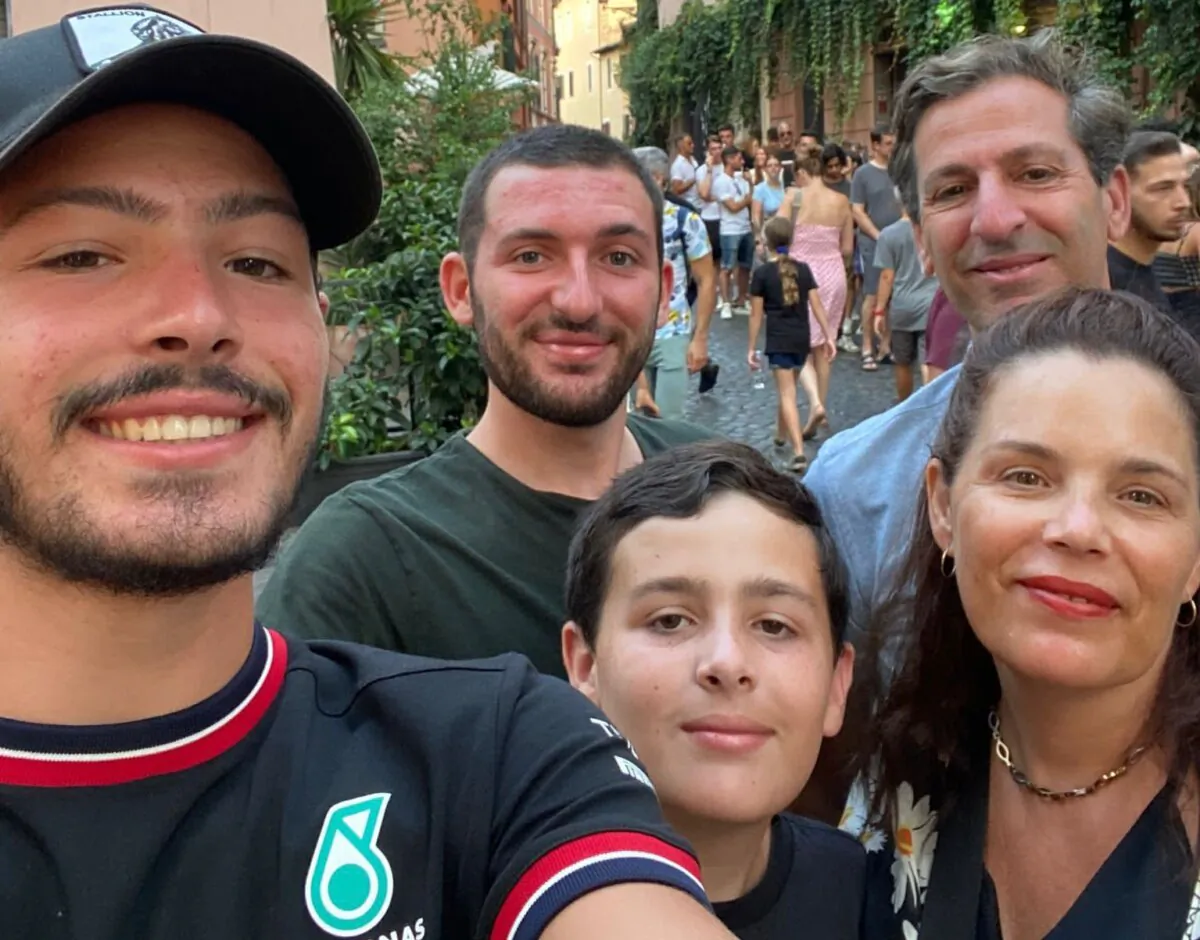 Hostage Itay Chen (L) with brothers Roy and Alon and parents Ruby and Hagit (R), in an undated photo taken in Italy. (Courtesy of Ruby Chen)