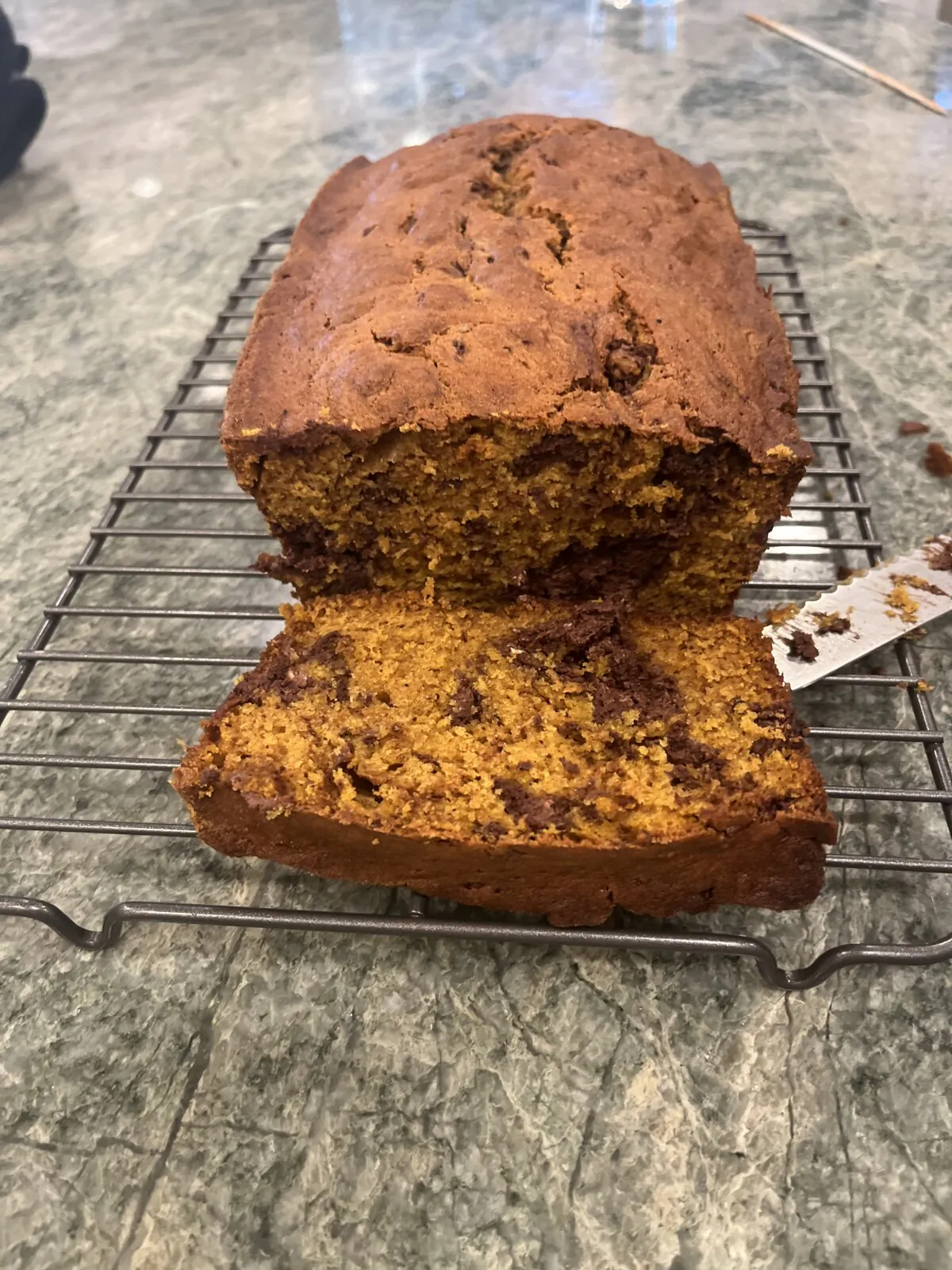The spiced pumpkin flavor complements the chocolate cheesecake swirls. (Diane Rossen Worthington/TCA)