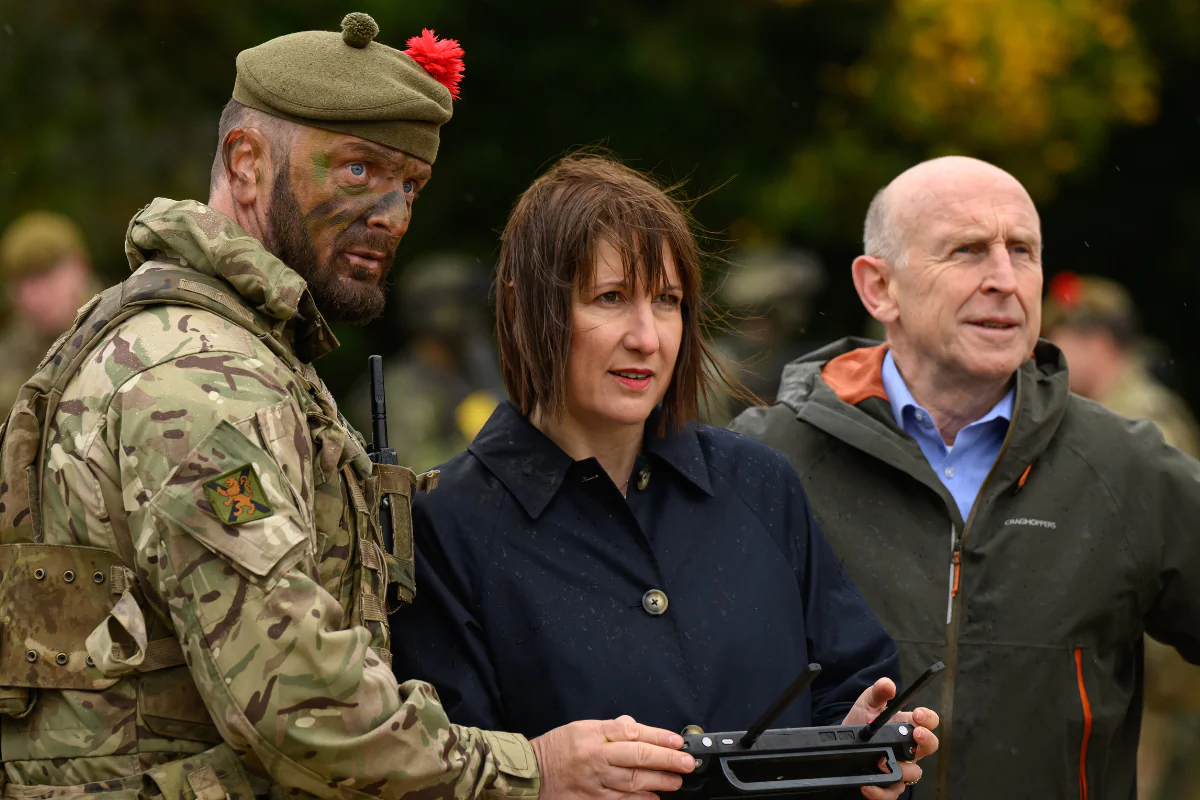 Chancellor of the Exchequer Rachel Reeves operates a Max Evo drone as Defence Secretary John Healey looks on at the Stanford Training Area to meet with British and Ukrainian troops training there, near Thetford, England, on Oct. 20, 2024. (Leon Neal/PA Wire)