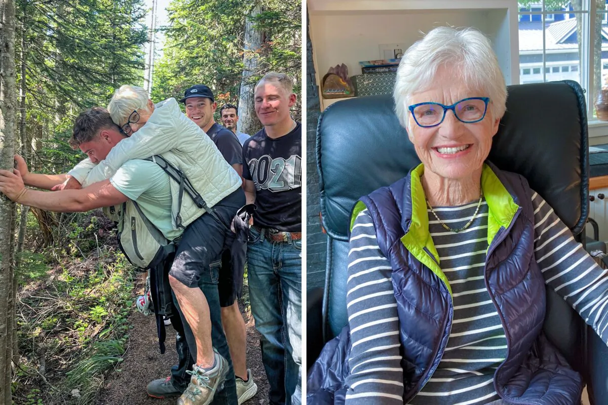 U.S. Air Force Airman 1st Class Troy May carries Ursula Bannister, 79, on his back on the High Rock trail near Ashford, Washington, Aug. 28, 2024. (U.S. Air Force courtesy photo)