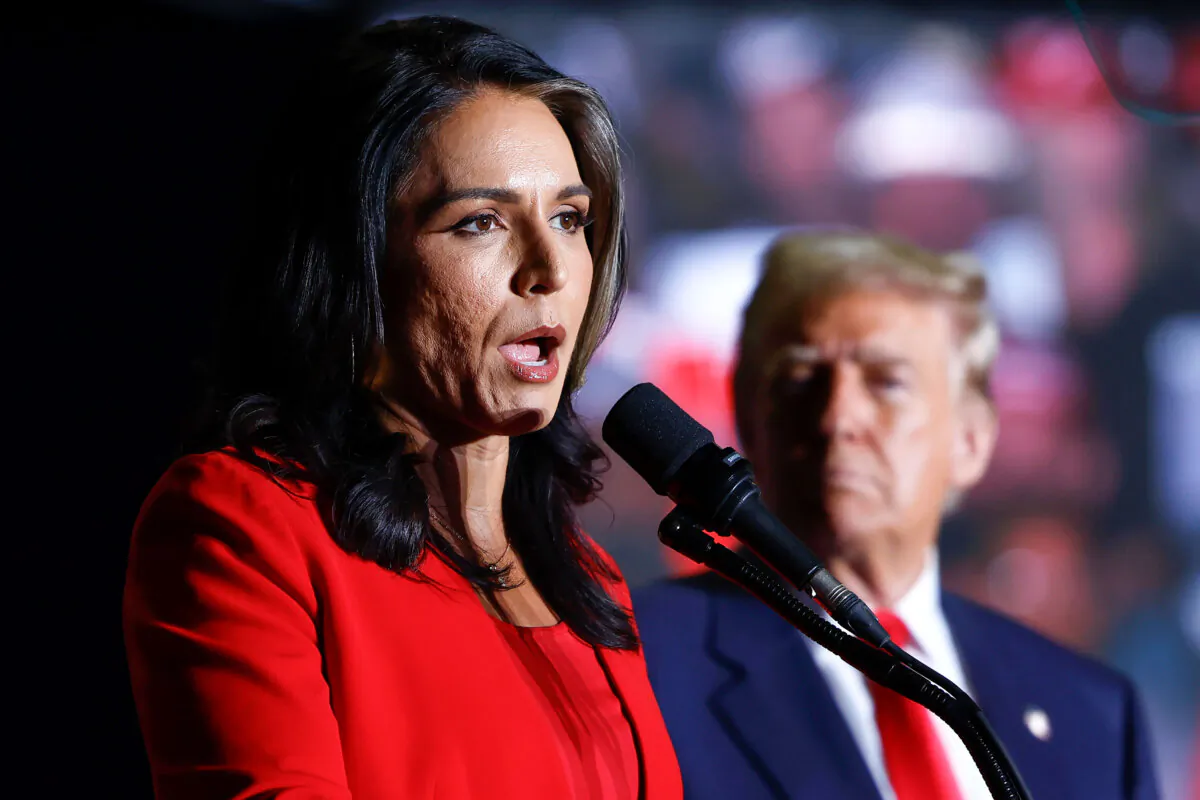 Former Congresswoman Tulsi Gabbard speaks as former President Donald Trump listens at a campaign rally at the Greensboro Coliseum in Greensboro, N.C., on Oct. 22, 2024. (Anna Moneymaker/Getty Images)