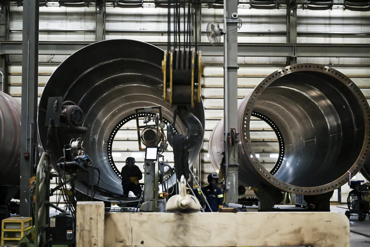 A factory worker is seen at a wind tower manufacturing plant in Pueblo, Colo., on Nov. 29, 2023. (Andrew Caballero-Reynolds/AFP/Getty Images)