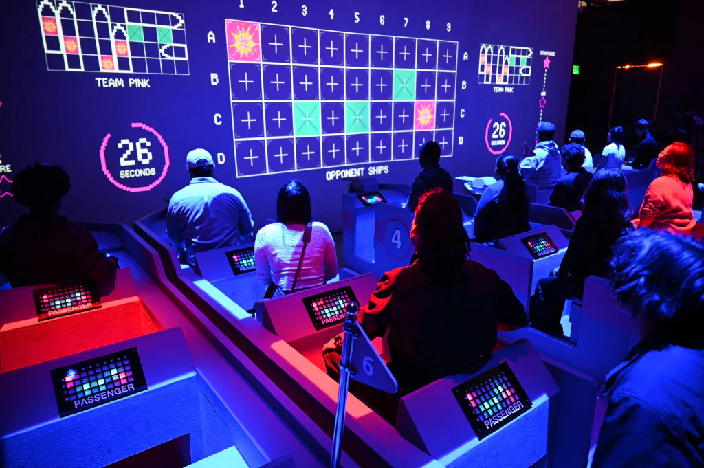 Visitors participate in "Squid Game: The Trials," an in-person interactive competition experience based on the Netflix show "Squid Games," in Los Angeles on Dec. 20, 2023. (Robyn Beck/AFP via Getty Images)