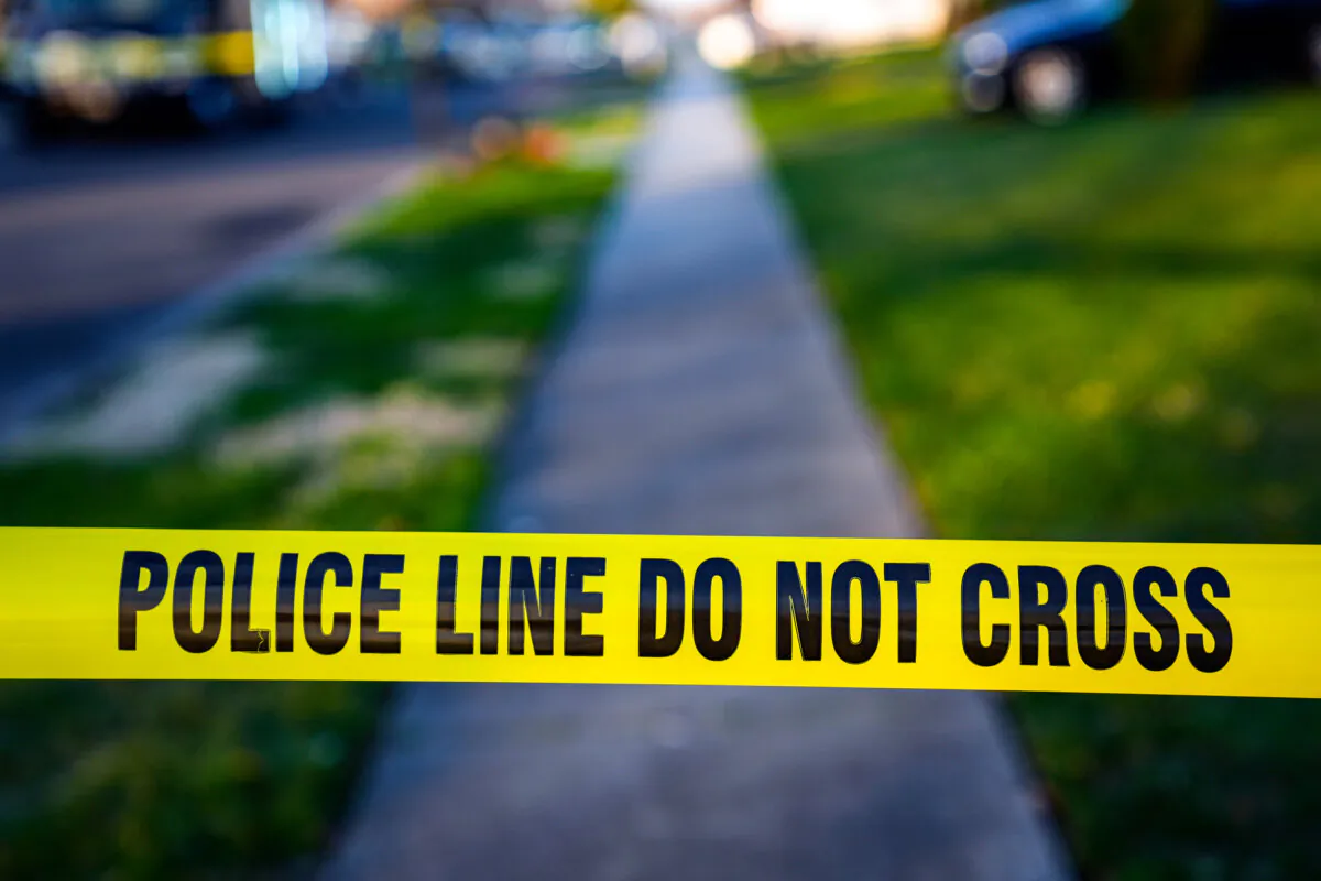 Police tape cordons off a street in a file photo. (Matt Rourke/AP Photo)