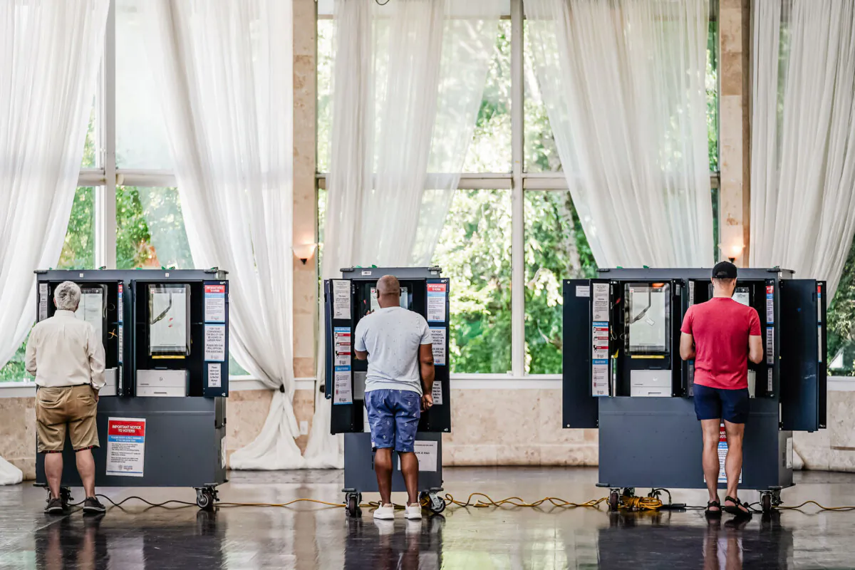 Voters cast ballots in Georgia's primary election at a polling location in Atlanta on May 21, 2024. (Elijah Nouvelage/Getty Images)