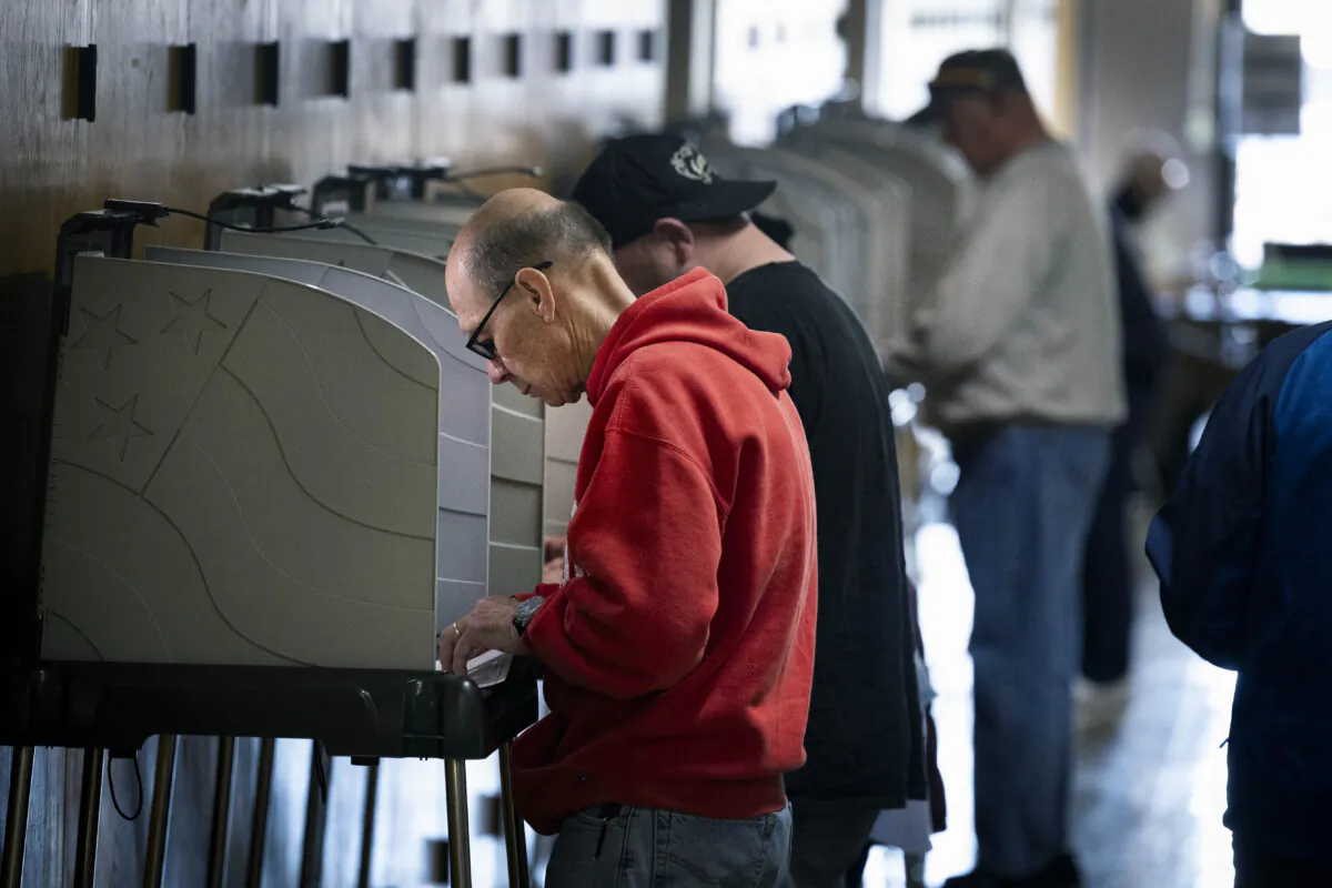 Residents vote at an in-person early voting location in the Kenosha Municipal Building on Oct. 24, 2024 in Kenosha, Wis. The city has experienced a record turnout for early voting. (Scott Olson/Getty Images)