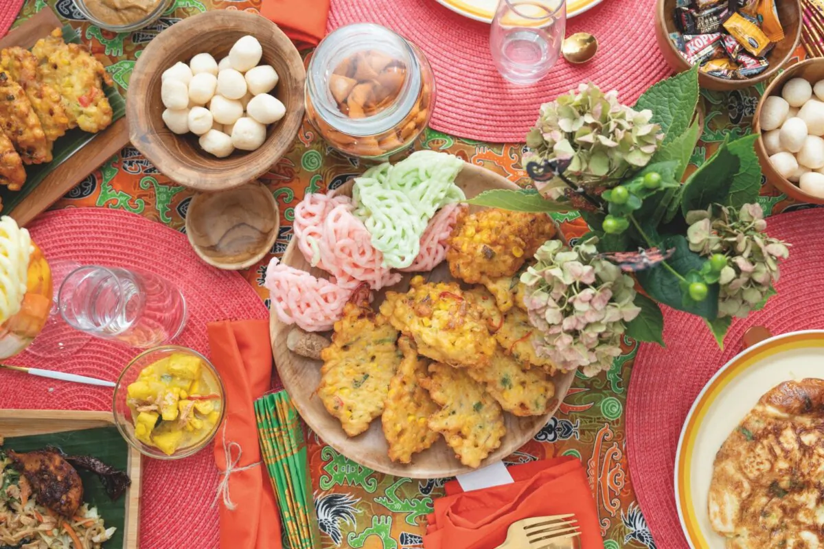 An Indonesian feast at cooking instructor Shandra Woworuntu’s
home in Queens, New  York, including tofu and egg omelets, corn and shrimp fritters, and an
assortment of Indonesian crackers and candy. (Samira Bouaou for American Essence)