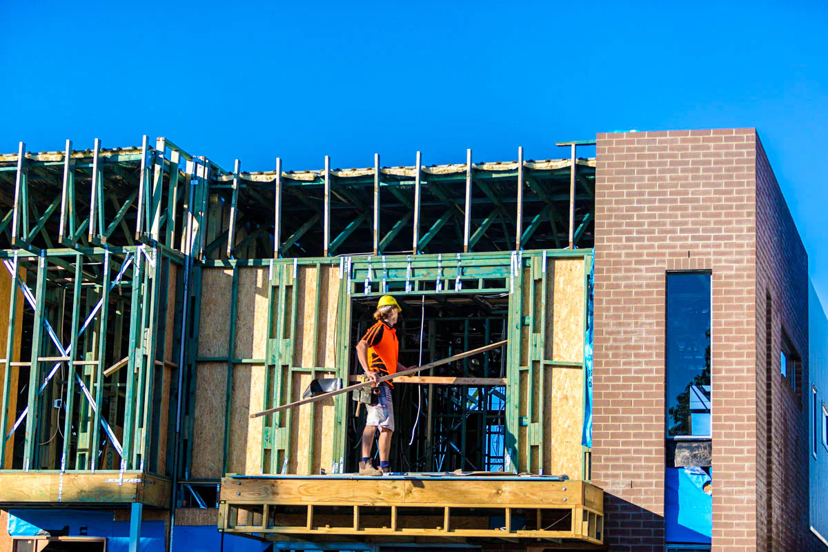 People work on new housing at North Lakes in Brisbane, Australia, on June 10, 2016. (Glenn Hunt/Getty Images)